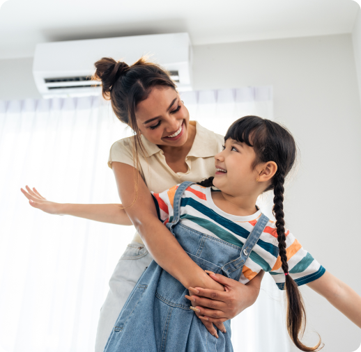 Female mother and daughter in a room with an airconditioner