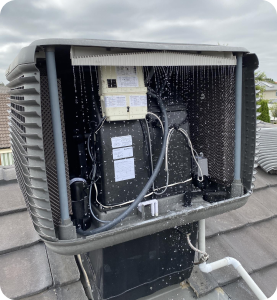 Evaporative cooler unit on roof