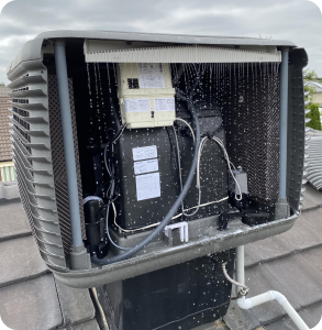 Evaporative cooler unit on roof