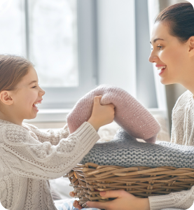 Family enjoying gas ducted heating at home