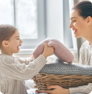 Family enjoying gas ducted heating at home