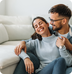 Couple enjoying gas ducted heating at home