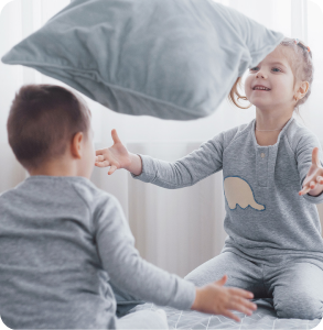 Children enjoying gas ducted heating at home