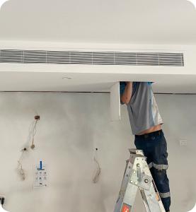 Man installing airconditioning